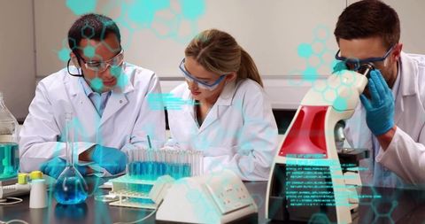 Research team collaborating at lab bench with microscope, test tubes and AR data
