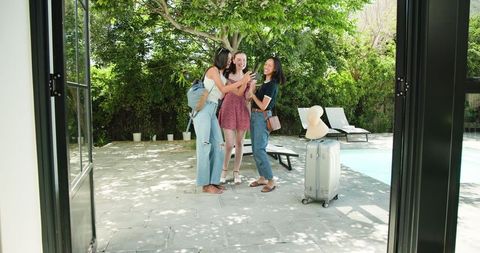 Sunny Poolside Vacation Arrival: Friends Document Travel Moments