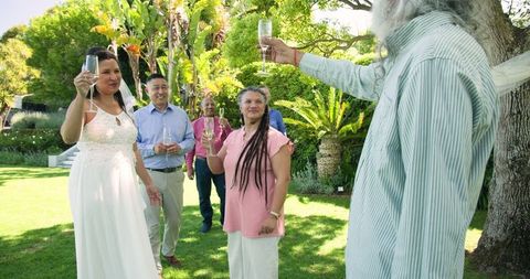 Beautiful Outdoor Wedding Reception with Diverse Senior Couple