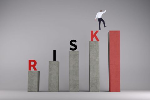 man balancing on risk graph depicting business challenges - Download Free Stock Templates Pikwizard.com