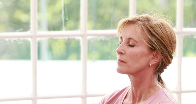 Middle-aged woman practicing mindfulness and meditation - Download Free Stock Images Pikwizard.com