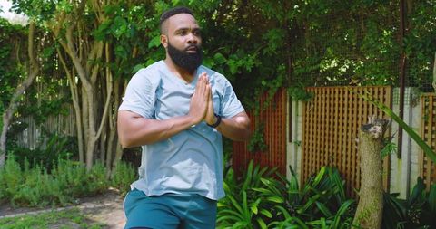 Man in Tree Pose for Outdoor Mindfulness and Balance