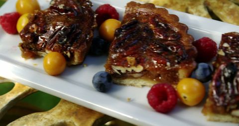 Pecan Pie Slices Elegantly Served with Fresh Berries - Download Free Stock Images Pikwizard.com