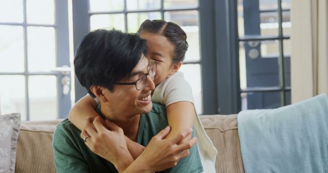 Father and Daughter Sharing Joyful Hug at Home - Download Free Stock Images Pikwizard.com