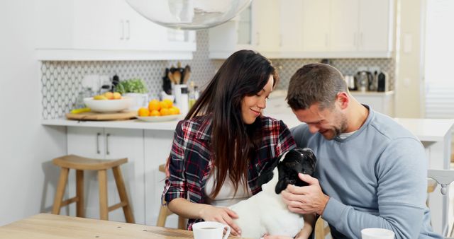 Happy Couple Enjoying Cozy Morning with Dog in Modern Kitchen - Download Free Stock Images Pikwizard.com