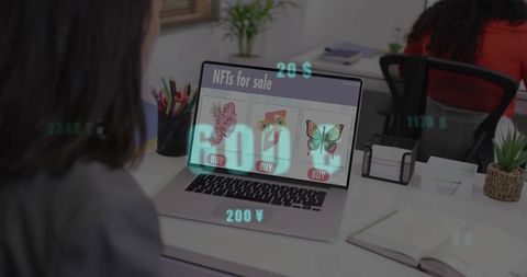 Laptop displaying nfts on modern workspace with holographic price overlays and colleagues