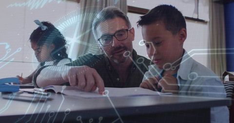 Teacher guiding student through workbook with circuit overlay illustrating STEM learning