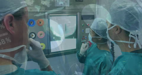Surgeons Analyzing Medical Data in High-Tech Operating Room