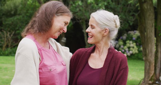 Senior Women Enjoying Warm Conversation in Park - Download Free Stock Images Pikwizard.com