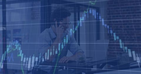 Businessman Analyzing Stock Market Data on Phone in Office