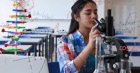 Student Conducting Experimental Research in Science Lab with Formulae Overlay - Download Free Stock Images Pikwizard.com