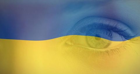 Ukraine Flag Overlay on Caucasian Woman's Eye Symbolizing Unity and Crisis Awareness