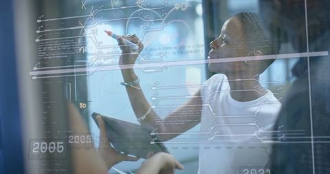 Innovative Professionals Analyzing Digital Data in Modern Office - Download Free Stock Images Pikwizard.com