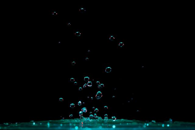 Water Bubbles Rising Against Black Background in Close-Up - Download Free Stock Photos Pikwizard.com