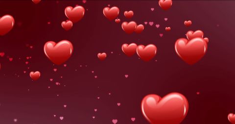 Red floating hearts on dark red background for valentine