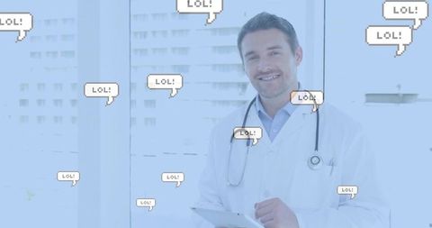 Doctor Receiving Humorous Messages on Tablet