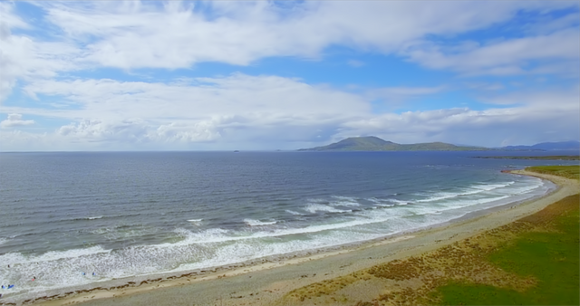 Transparent Waters Along Peaceful Beach with Cloudy Sky - Download Free Stock Videos Pikwizard.com