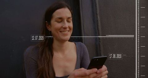 Smiling woman engaging with digital travel plans