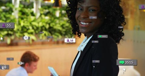 Smiling businesswoman holding smartphone with social media ui overlays in modern office