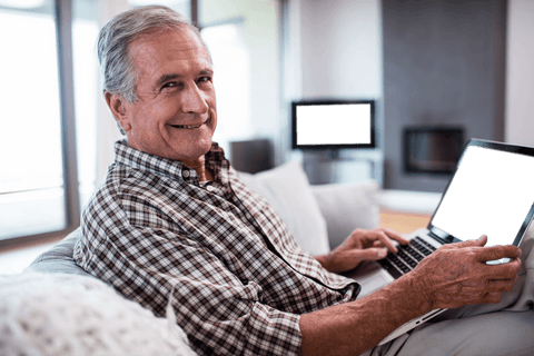 senior man relaxing with laptop transparent background - Download Free Stock Videos Pikwizard.com
