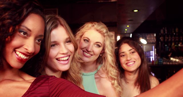 Cheerful Friends Smiling and Taking Selfie in Nightlife Bar - Download Free Stock Images Pikwizard.com