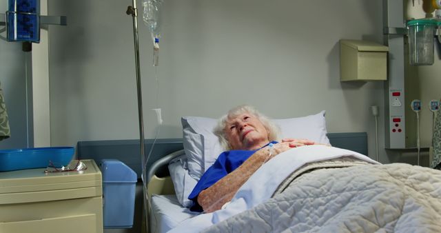 Senior Woman Resting in Hospital Bed in Medical Facility - Download Free Stock Images Pikwizard.com