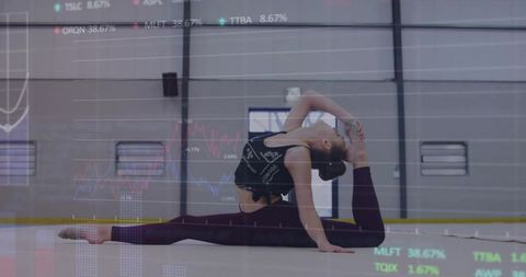 Young Gymnast Performing Deep Stretching Pose with Data Overlay