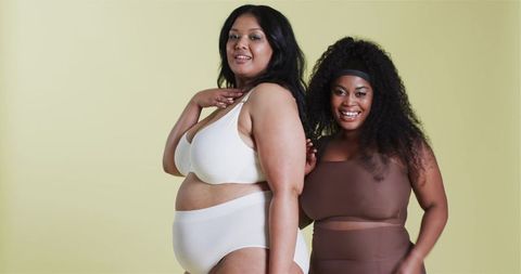 Confident Women Smiling in Lingerie Celebrating Diversity