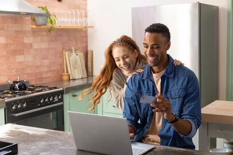 Happy Couple Shopping Online at Modern Home Kitchen