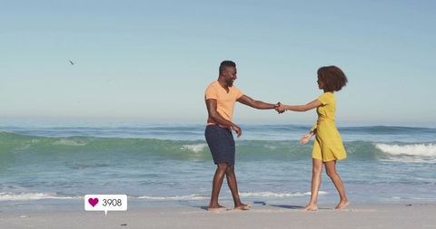 Romantic Beach Stroll Couple Holding Hands at Sunset