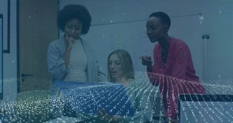 Diverse Businesswomen Collaborating on Innovative Project