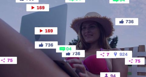 Woman in Bikini with Laptop Relaxing by Poolside with Social Media Icons