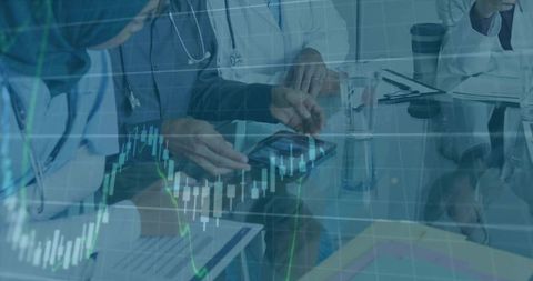 Doctors Analyzing Medical Data on Tablet with Financial Chart Overlay in Team Meeting