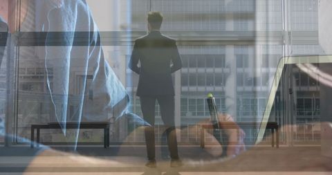 Modern Businessman Multitasking with Technology Overlay