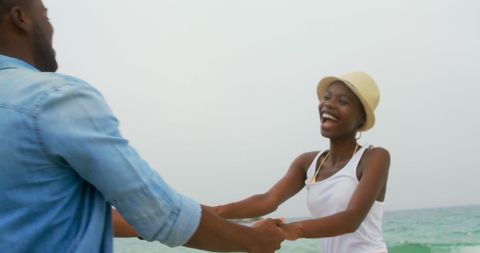 Joyful African American Couple Enjoying Beach