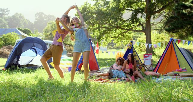 Friends Dancing Outdoors at Summer Camping Trip - Download Free Stock Images Pikwizard.com