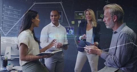 Business Team Collaborating with Digital Technology in Modern Office