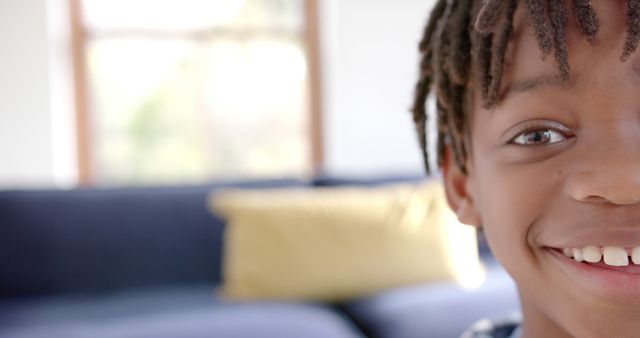 Happy Child with Dreadlocks Smiling at Home - Download Free Stock Images Pikwizard.com