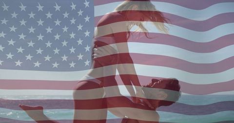 Happy Couple Embracing by Ocean with USA Flag Overlay