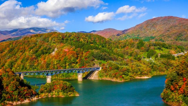 Scenic Autumn Landscape with River and Bridge in Mountainous Region - Download Free Stock Photos Pikwizard.com