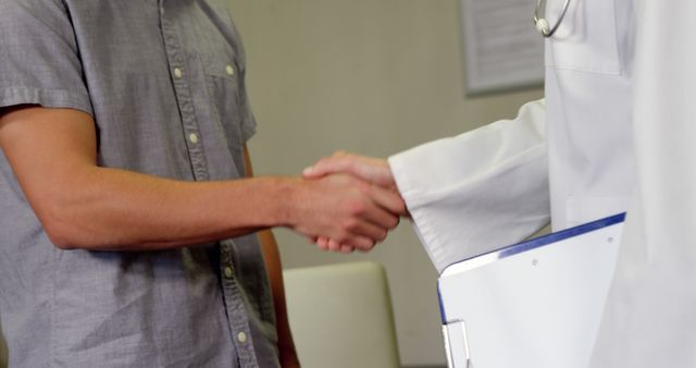 Patient Shaking Hands with Doctor in Office - Download Free Stock Images Pikwizard.com