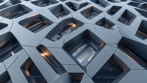 Futuristic tessellated architecture facade with warm lighting