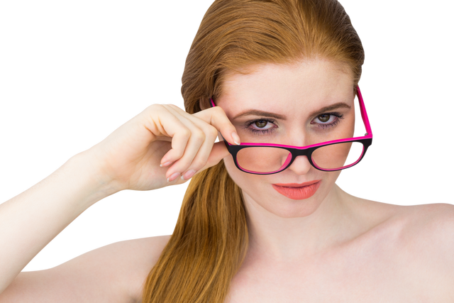 Beautiful redhead woman posing with transparent eyeglasses - Download Free Stock Videos Pikwizard.com