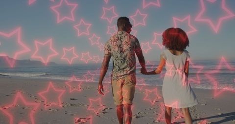 Romantic Couple Walking on Beach with Neon Stars Overlay