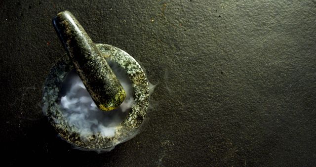 Mortar and pestle with spices and smoky effect - Download Free Stock Photos Pikwizard.com