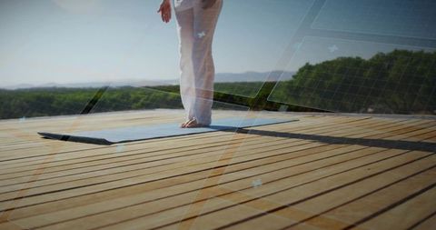 Outdoor Yoga Pose on Wooden Deck with Grid Overlay