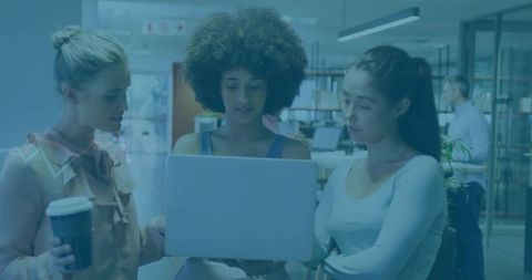 Diverse teamwork: women collaborating in modern office