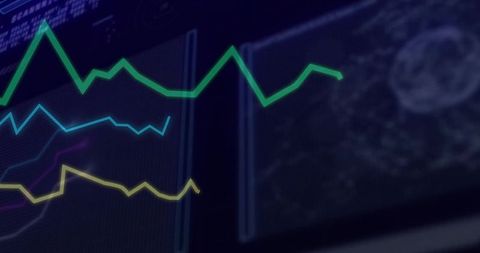 Colorful line graphs on digital display in control room