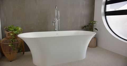 Elegant Minimalist Bathroom with Freestanding Bathtub