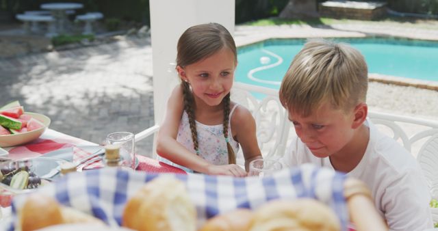 Children Enjoying Outdoor Picnic by Pool on Sunny Day - Download Free Stock Images Pikwizard.com